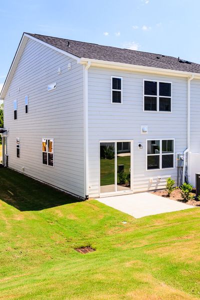 Exterior details and patio area of a home in Vaughan Farms, Angier (Image 20).
