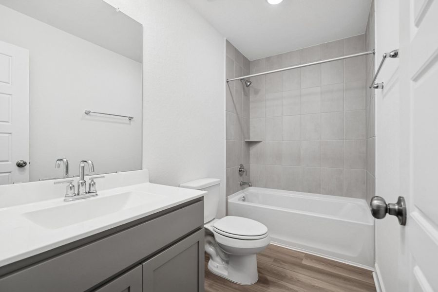 Furnished interior view inside a new home in Pinewood at Grand Texas, New Caney (Image 5).