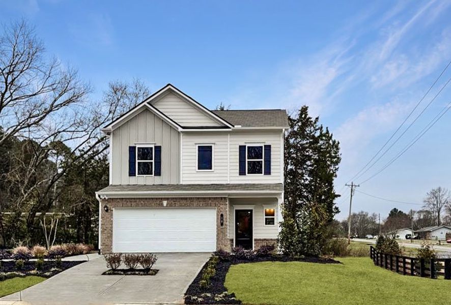 Front exterior of a new home in Hillcrest Park, Ringgold, GA, highlighting curb appeal (Image 1). Front exterior of a new home in Hillcrest Park, Ringgold, GA, highlighting curb appeal (Image 1).
