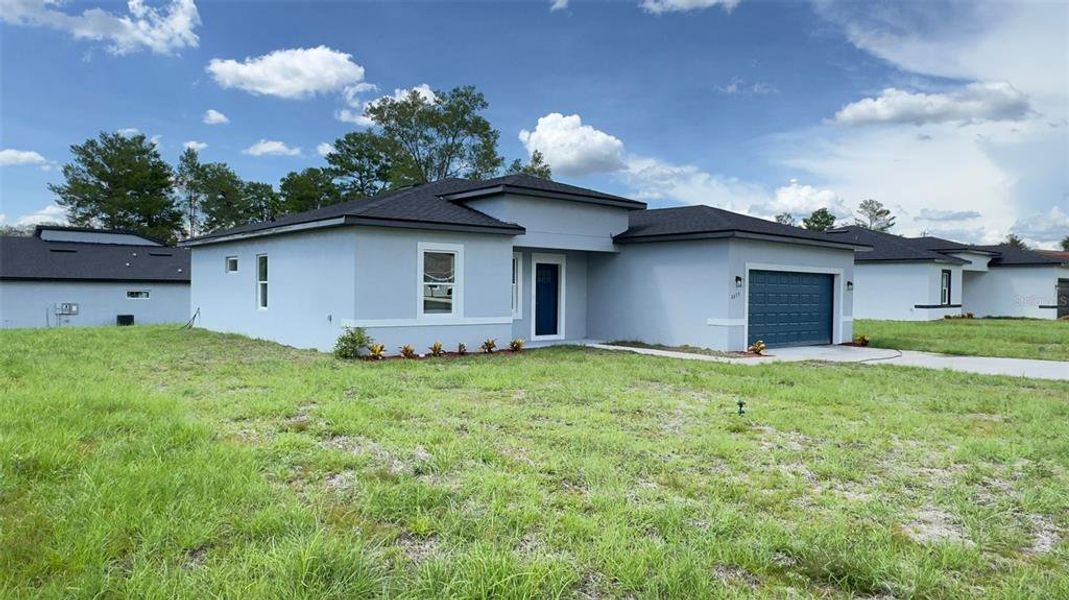 Front exterior of a new home in , Ocala, FL, highlighting curb appeal (Image 15). Front exterior of a new home in , Ocala, FL, highlighting curb appeal (Image 15).