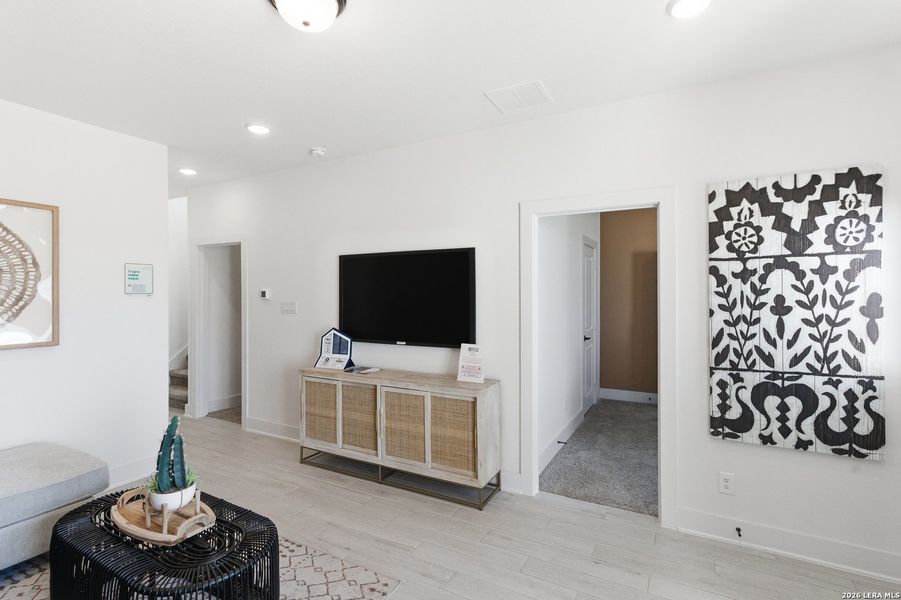 Furnished interior view inside a new home in Centero at Stone Oak, San Antonio (Image 6).