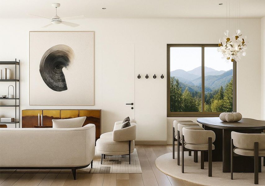 Living area with hardwood / wood-style flooring, a mountain view, healthy amount of natural light, and ceiling fan Living area with hardwood / wood-style flooring, a mountain view, healthy amount of natural light, and ceiling fan