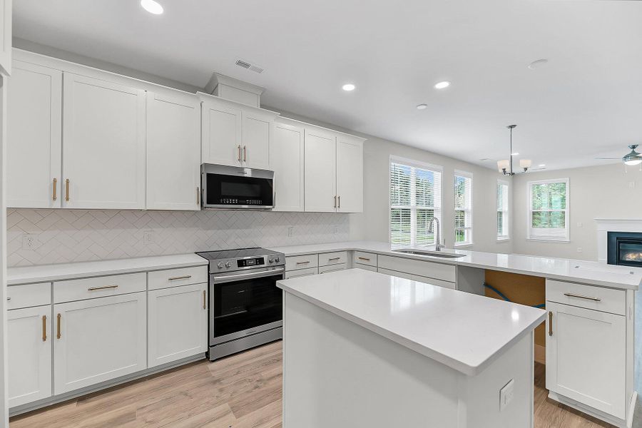 Furnished interior view inside a new home in Sweetgrass Station, Summerville (Image 8).
