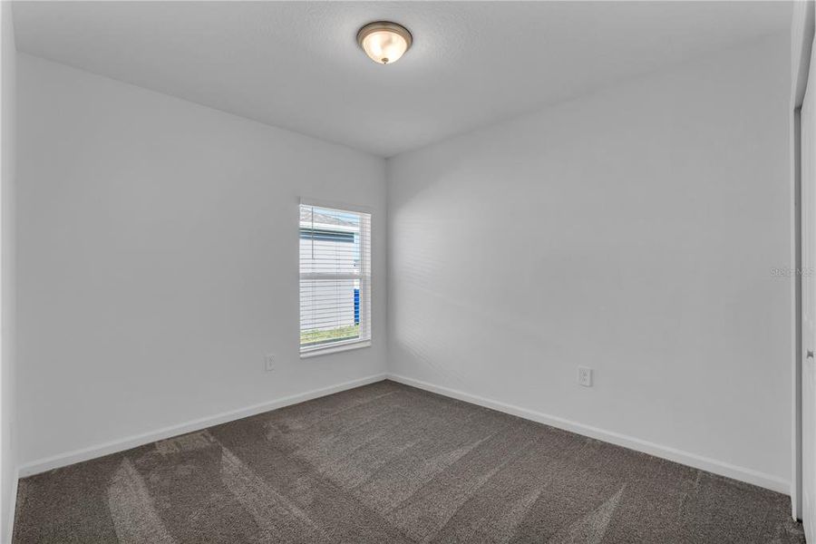 Spacious, unfurnished interior of a new home in Knightsbridge, Kissimmee (Image 25).