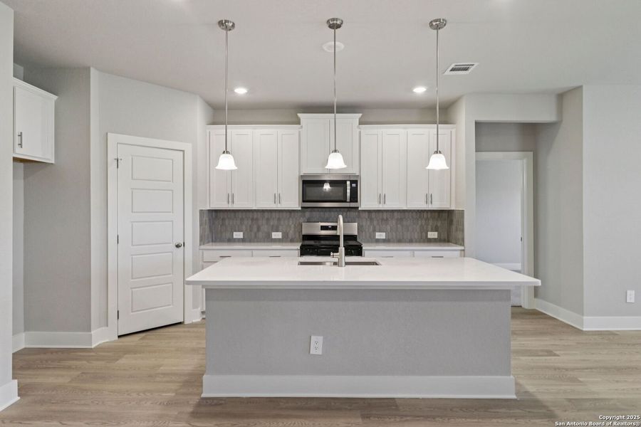 Furnished interior view inside a new home in Scenic Crest - Premier Series, Boerne (Image 4).