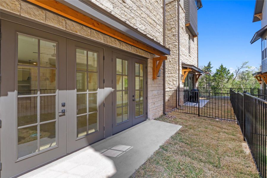 Exterior details and patio area of a home in Hacienda, Austin (Image 26).