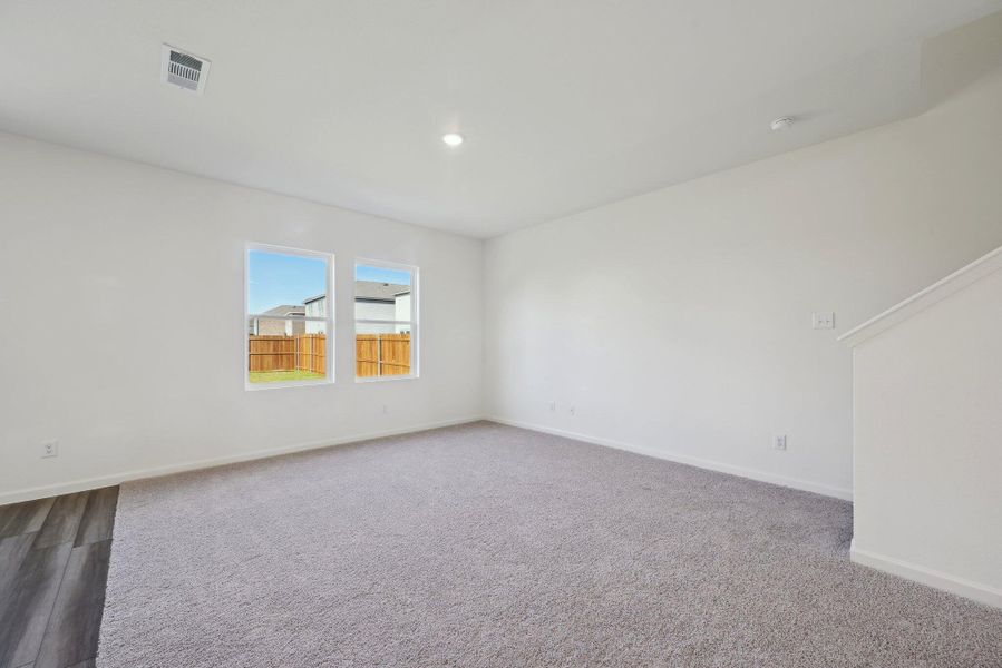 Spacious, unfurnished interior of a new home in Pender Woods at Cane Bay, Summerville (Image 8).