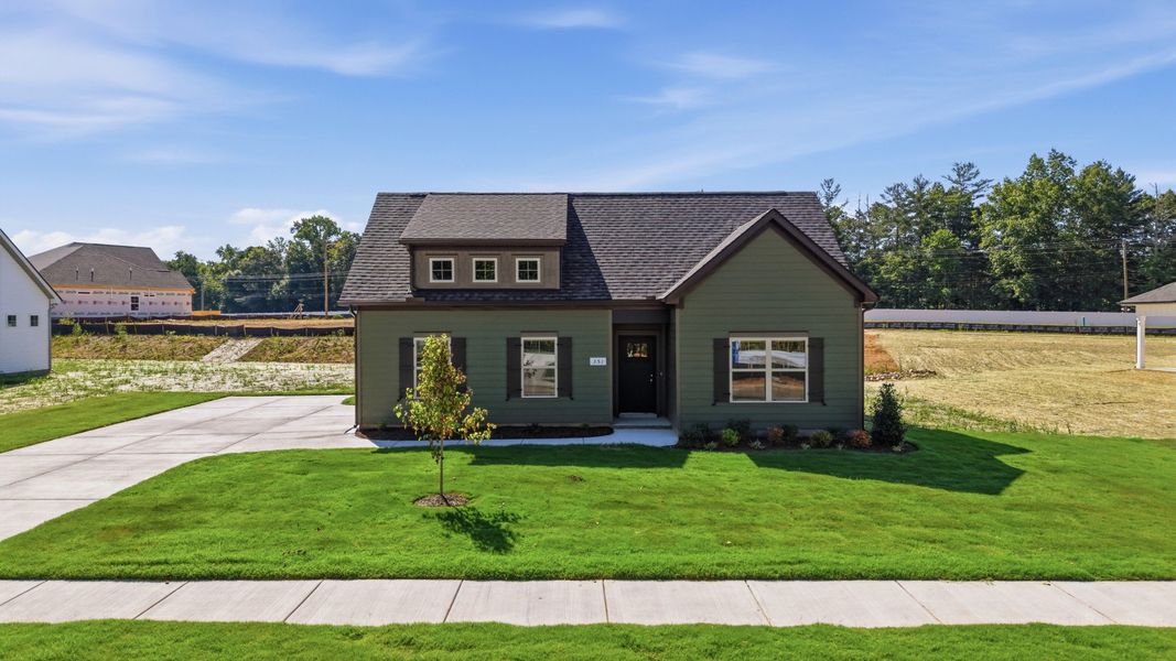 Front exterior of a new home in Stillwater, Tullahoma, TN, highlighting curb appeal (Image 16). Front exterior of a new home in Stillwater, Tullahoma, TN, highlighting curb appeal (Image 16).