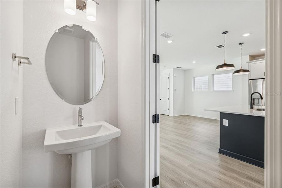 Furnished interior view inside a new home in Weslyn Park in Sunbridge 34', St. Cloud (Image 11).