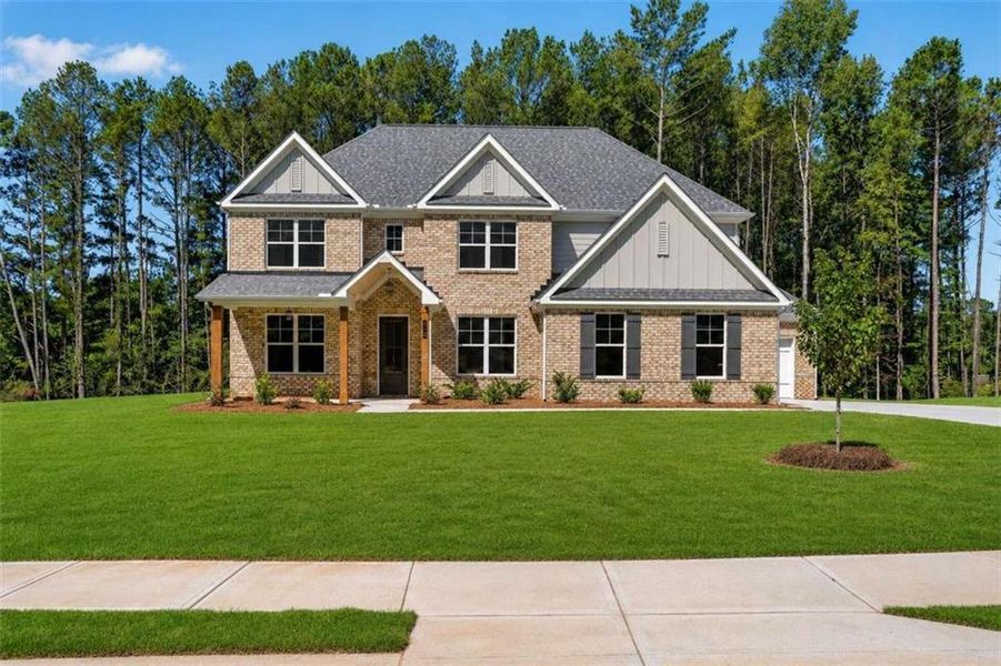 Front exterior of a new home in Patillo Manor, Stockbridge, GA, highlighting curb appeal (Image 2). Front exterior of a new home in Patillo Manor, Stockbridge, GA, highlighting curb appeal (Image 2).