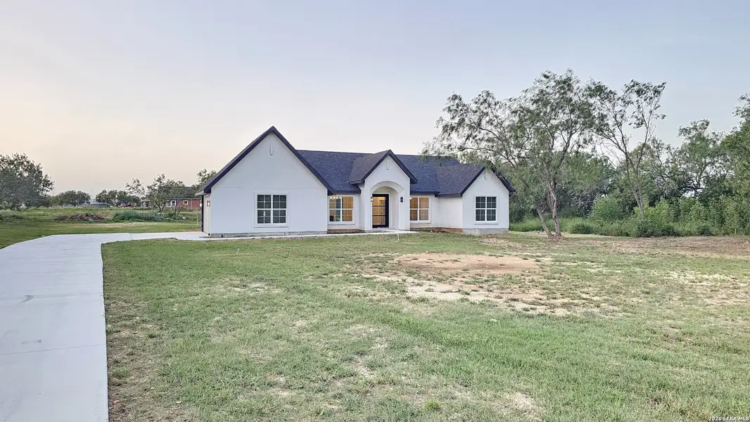 Front exterior of a new home in , San Antonio, TX, highlighting curb appeal (Image 2). Front exterior of a new home in , San Antonio, TX, highlighting curb appeal (Image 2).