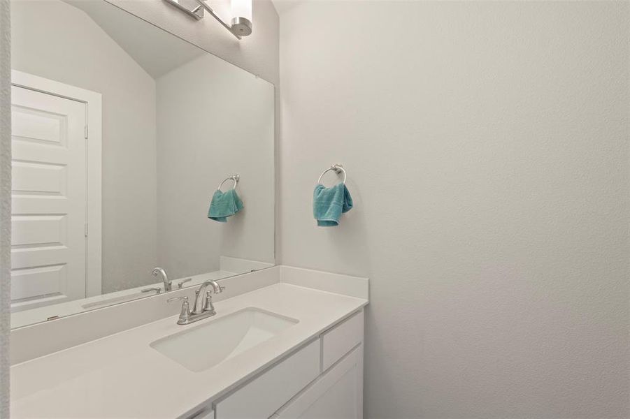 Bathroom featuring vanity