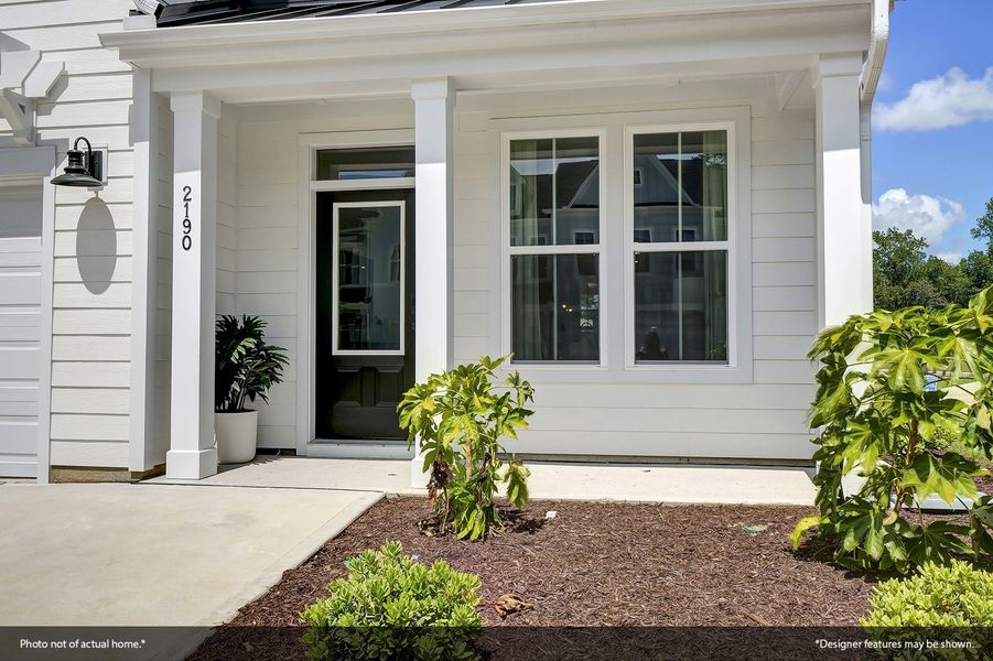 Front exterior of a new home in Bally Castle, Murrells Inlet, SC, highlighting curb appeal (Image 2).