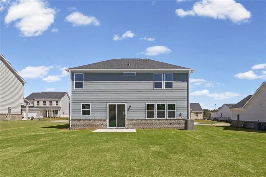 Exterior details and patio area of a home in Overland, Locust Grove (Image 20).