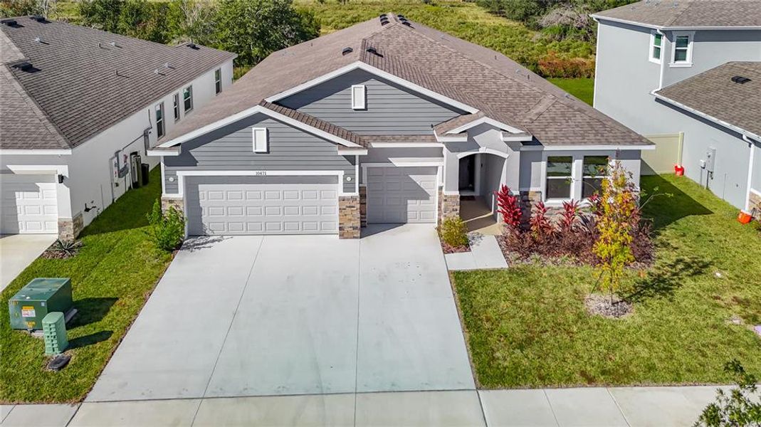 Front exterior of a new home in Mirada, San Antonio, FL, highlighting curb appeal (Image 2).