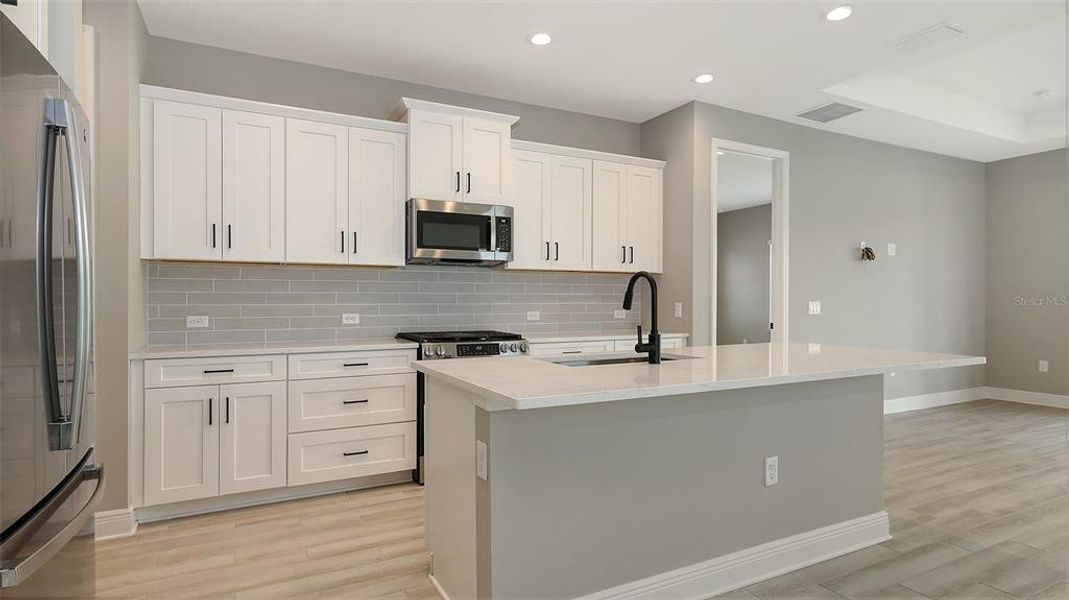 Furnished interior view inside a new home in Palm Grove, Lakewood Ranch (Image 11).