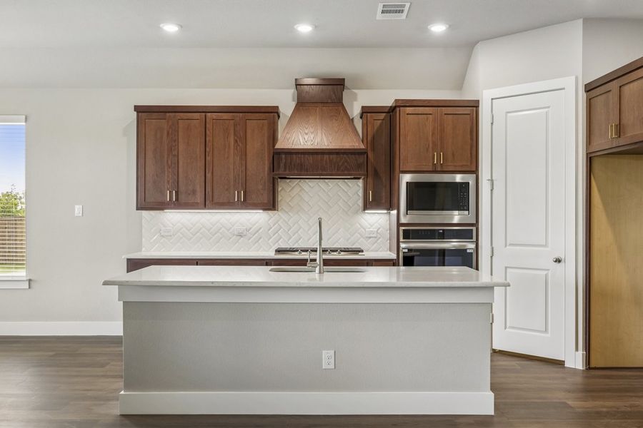 Representative furnished interior of a home built from the The Mockingbird by Lillian Custom Homes in Polo Ridge, Forney (Image 11).