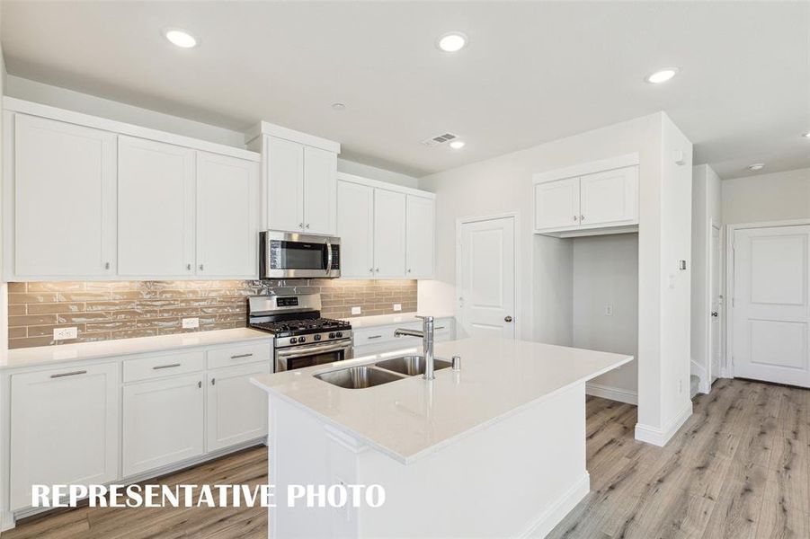 The kitchen island is the perfect place for a quick meal or homework station.  REPRESENTATIVE PHOTO