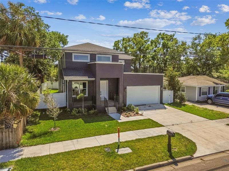 Front exterior of a new home in , Tampa, FL, highlighting curb appeal (Image 27). Front exterior of a new home in , Tampa, FL, highlighting curb appeal (Image 27).