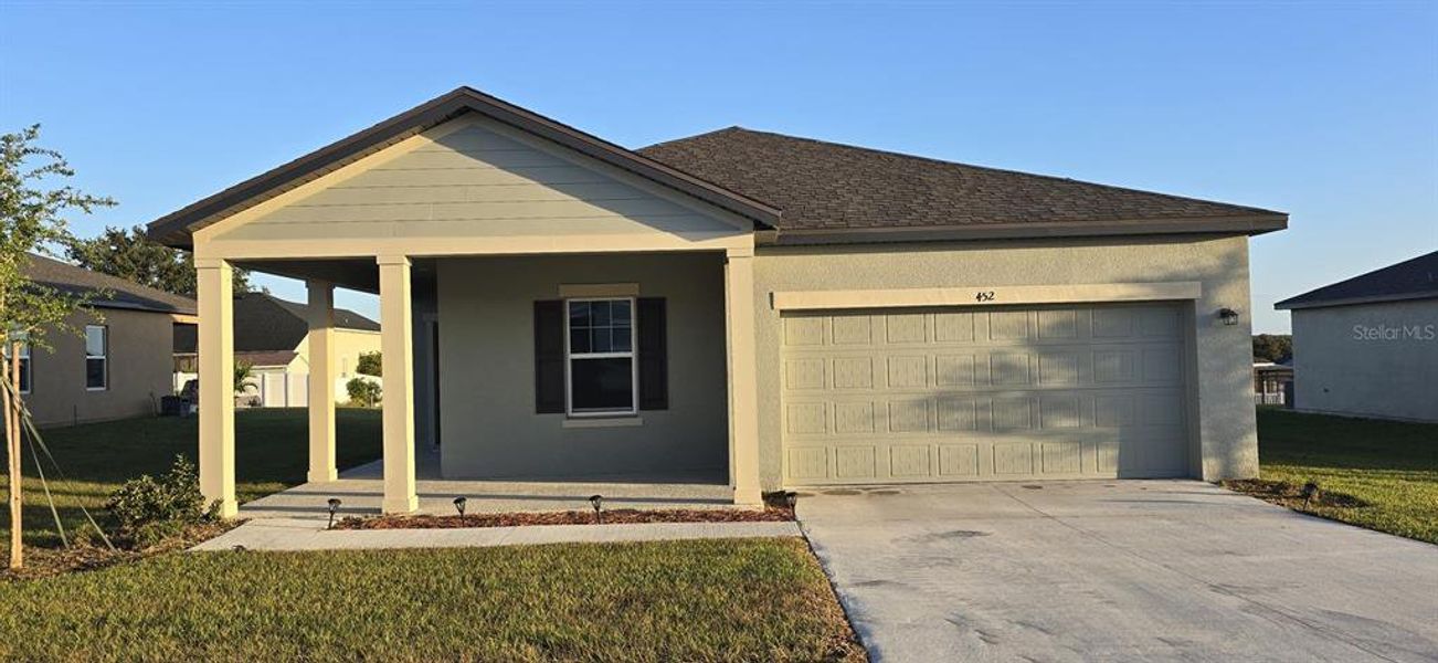 Front exterior of a new home in , Lake Wales, FL, highlighting curb appeal (Image 2). Front exterior of a new home in , Lake Wales, FL, highlighting curb appeal (Image 2).
