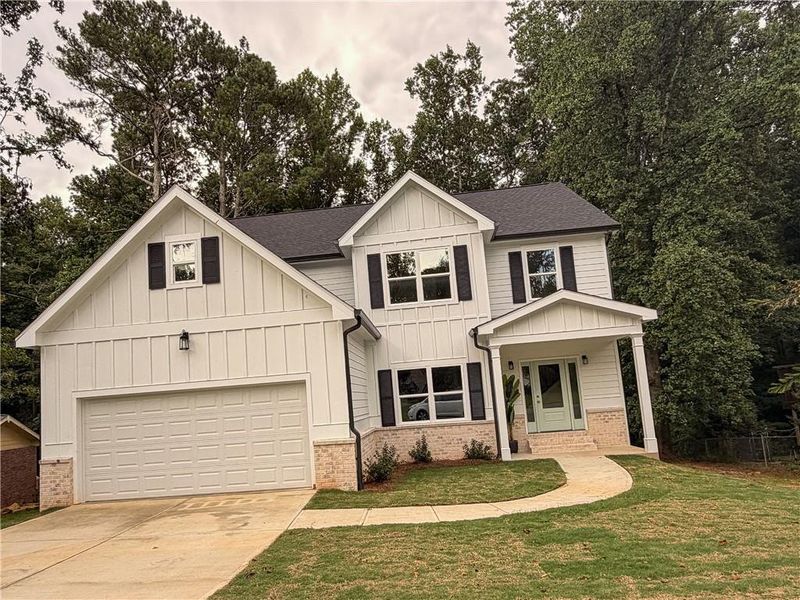 Front exterior of a new home in , Norcross, GA, highlighting curb appeal (Image 27). Front exterior of a new home in , Norcross, GA, highlighting curb appeal (Image 27).