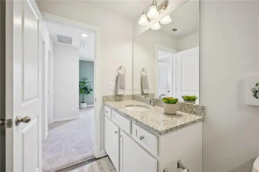 Furnished interior view inside a new home in Cash's Crossing, Ellenwood (Image 12).