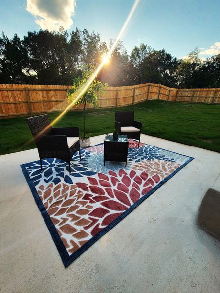 Relax and enjoy pretty sunsets from the back patio