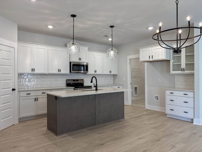 Furnished interior view inside a new home in The Paddock, Gallatin (Image 3).