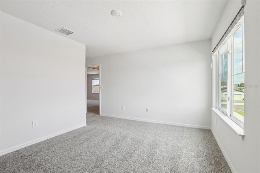 Spacious, unfurnished interior of a new home in Two Rivers - Signature Series, Zephyrhills (Image 38). Spacious, unfurnished interior of a new home in Two Rivers - Signature Series, Zephyrhills (Image 38).