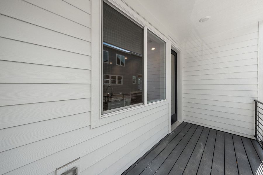 Exterior details and patio area of a home in Berkeley Villas, Denver (Image 4).