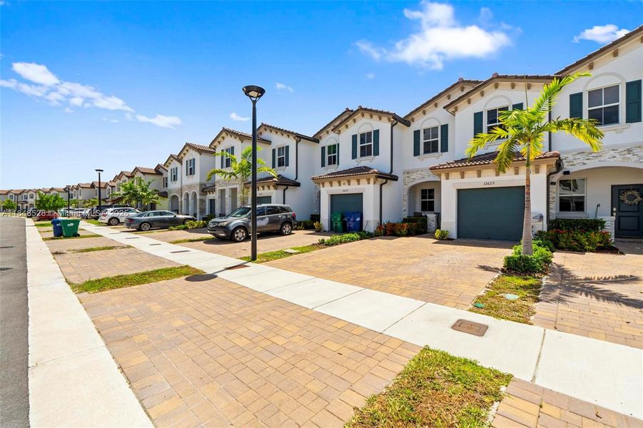 Front exterior of a new home in , Miami, FL, highlighting curb appeal (Image 20).