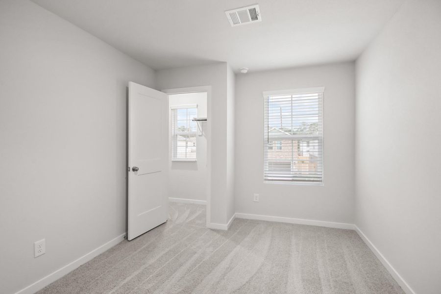 Spacious, unfurnished interior of a new home in Lakes at Black Oak, Magnolia (Image 19).