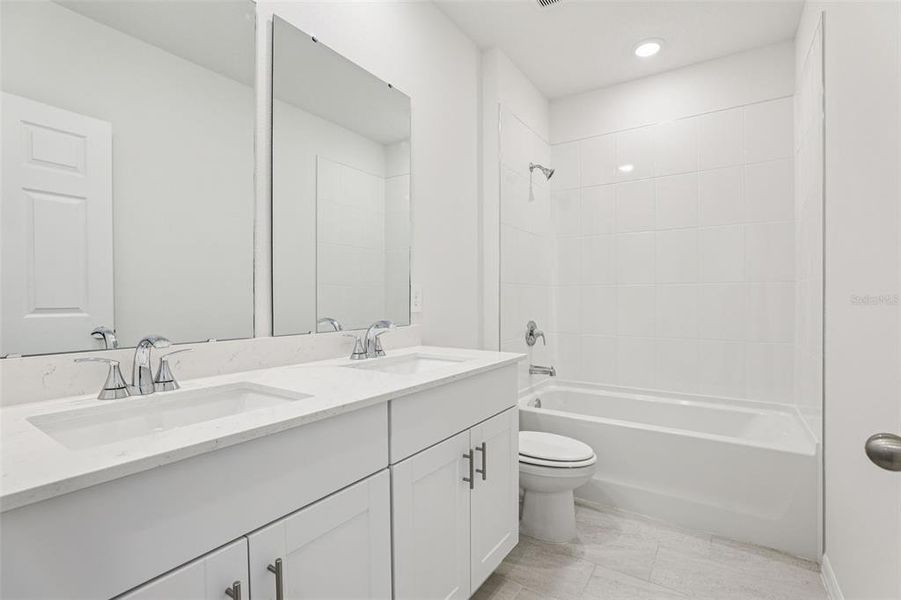 Furnished interior view inside a new home in Lake Deer Estates - Signature Series, Poinciana (Image 7).