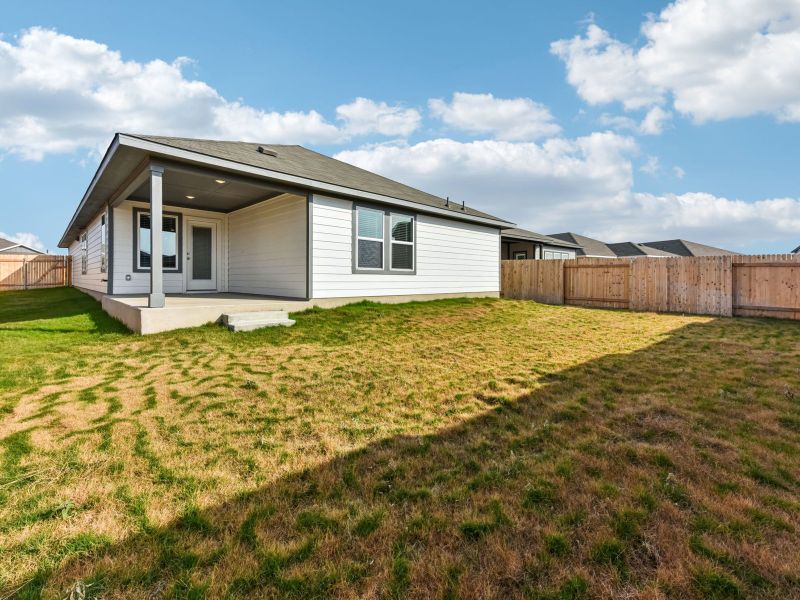 Exterior details and patio area of a home in Riverbend at Double Eagle - Reserve Collection, Cedar Creek (Image 14).
