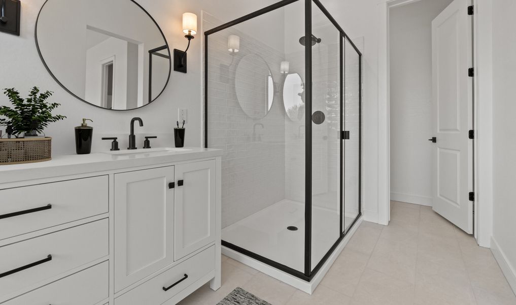 Glass shower enclosure in primary bath