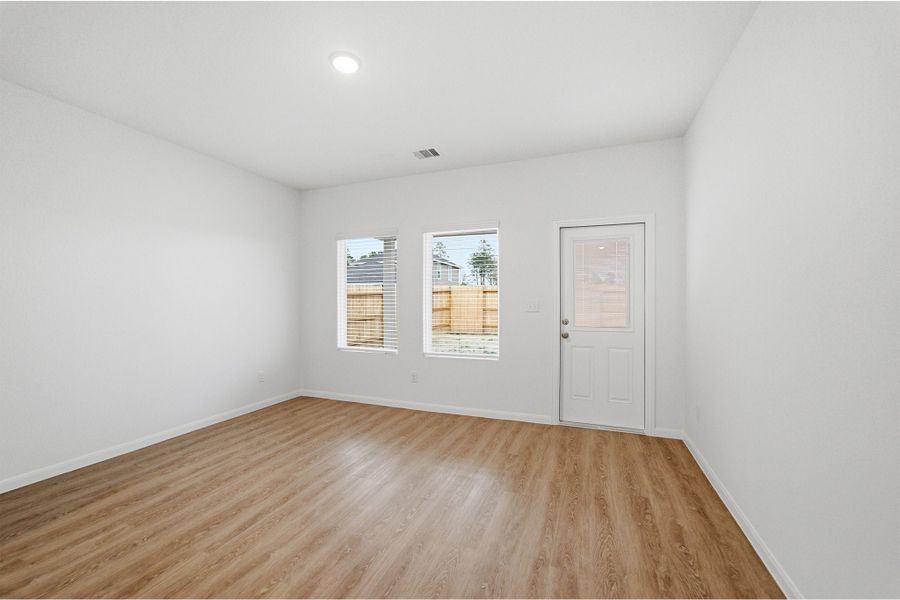 Spacious, unfurnished interior of a new home in The Canopies, Splendora (Image 37).