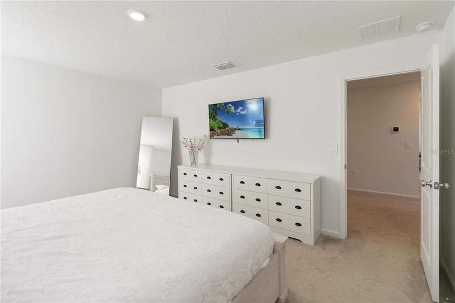 Furnished interior view inside a new home in Peace Creek Reserve: Manor Key Collection, Winter Haven (Image 20).