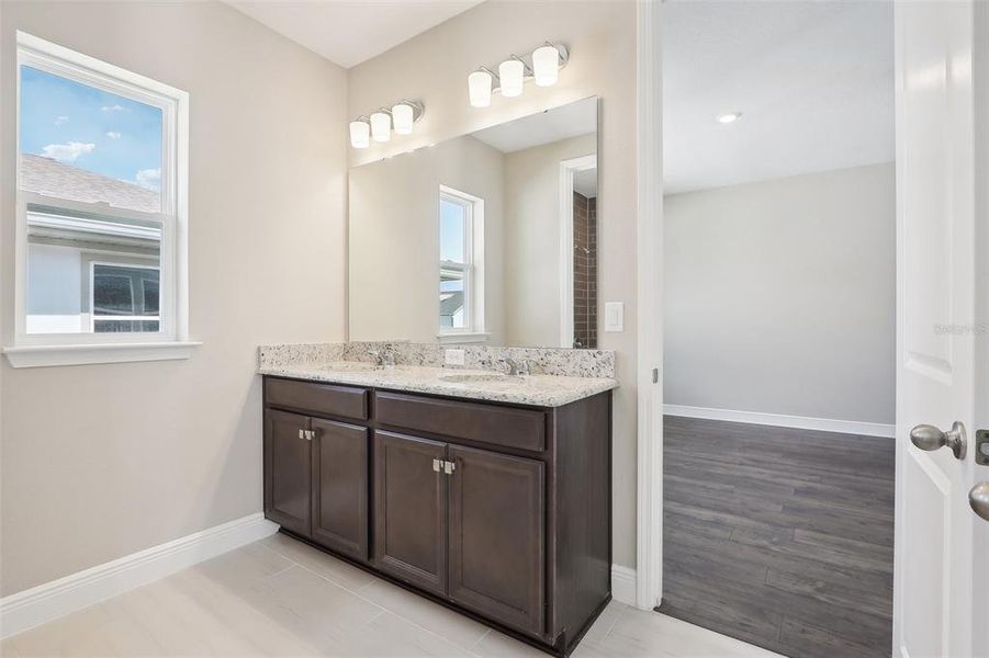 Furnished interior view inside a new home in Laureate Park, Orlando (Image 6).