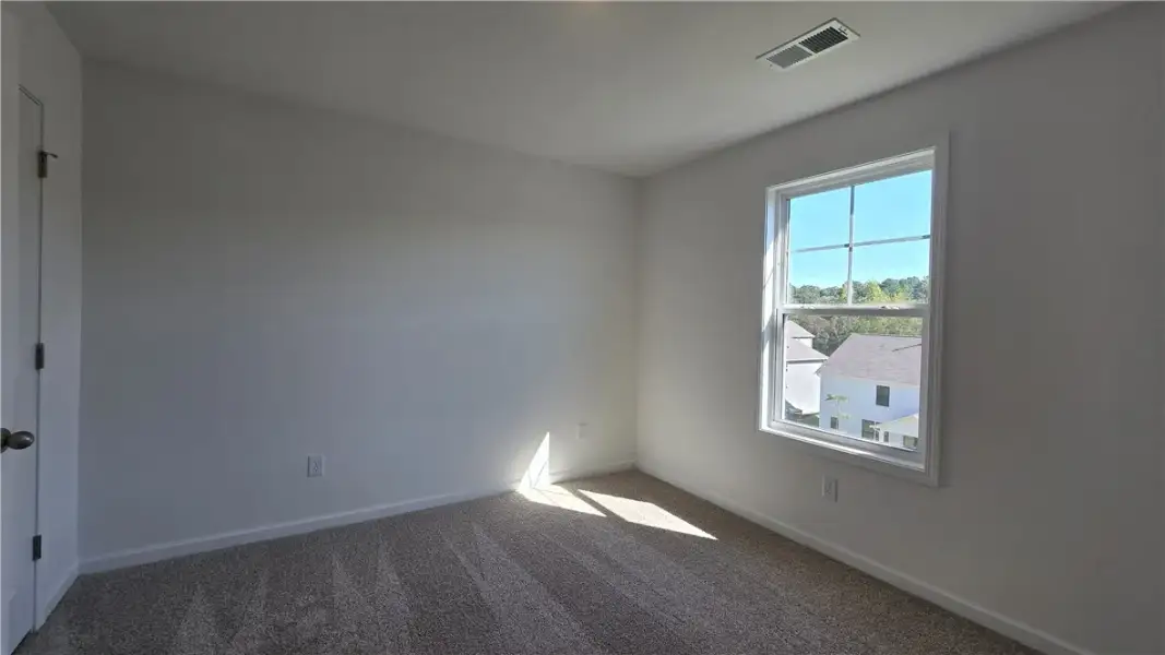 Natural light streams through a single window onto