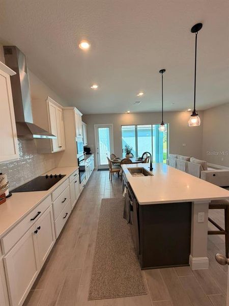 Furnished interior view inside a new home in , Winter Garden (Image 10).
