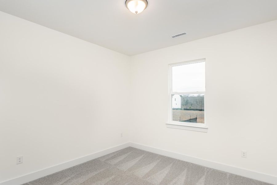 Spacious, unfurnished interior of a new home in Ford Meadows, Garner (Image 25).