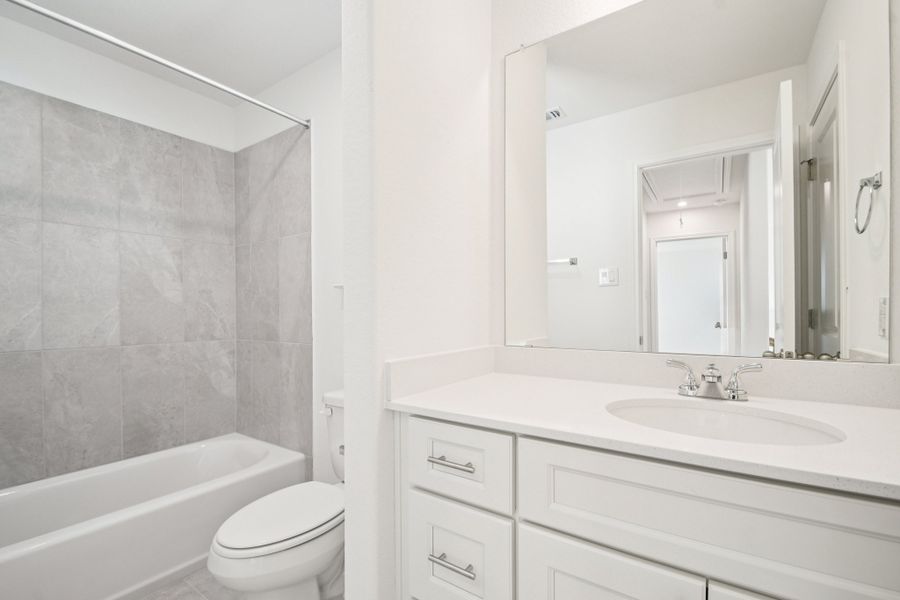 Furnished interior view inside a new home in Crosswinds, Kyle (Image 10).