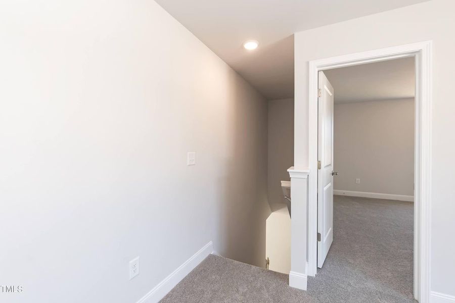Representative unfurnished interior of a home built from the 2721 by Adams Homes in Hidden Pines, Cameron (Image 23).