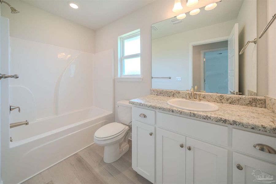 Furnished interior in a model home at Westpointe Place in Pensacola (Image 8).