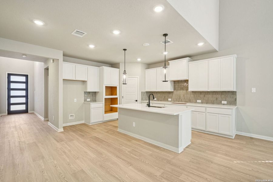 Furnished interior view inside a new home in Estancia Ranch - Classic Series, San Antonio (Image 14).