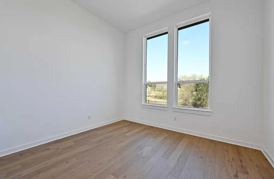 Spacious, unfurnished interior of a new home in Meridiana, Manvel (Image 13).