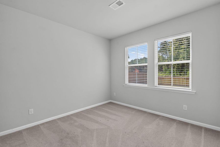 Spacious, unfurnished interior of a new home in Sweetgrass at Summers Corner, Summerville (Image 48).