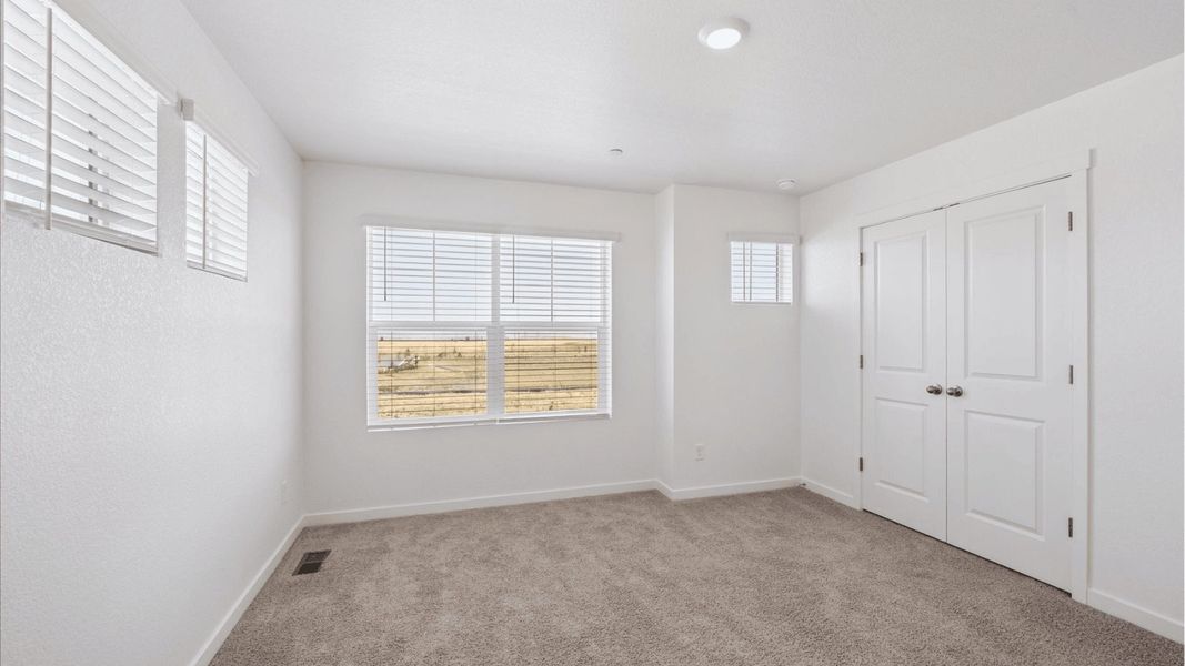 Spacious, unfurnished interior of a new home in Settlers Crossing, Commerce City (Image 23).