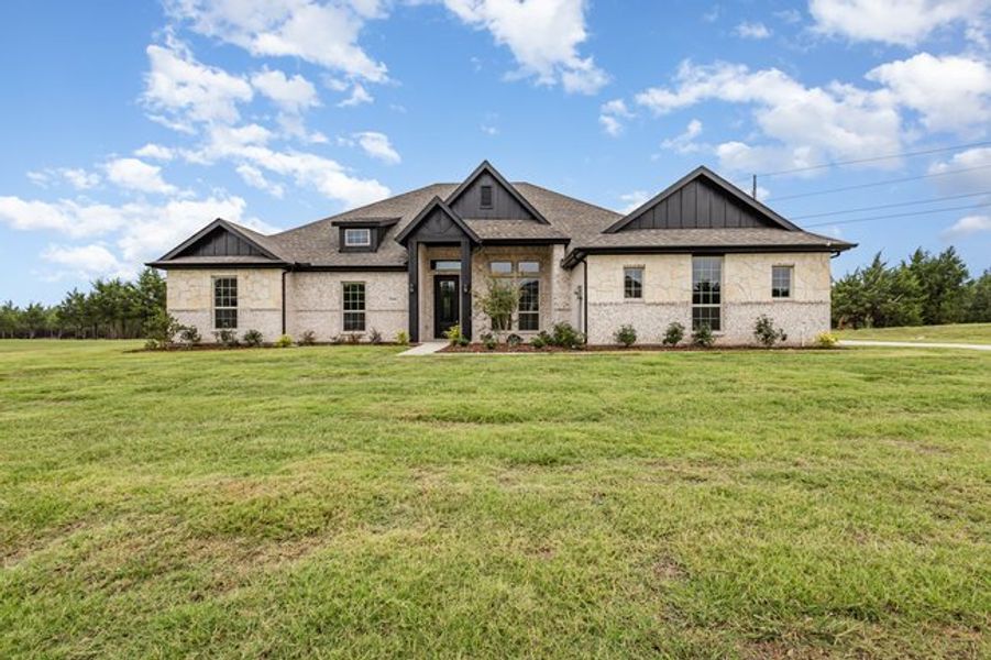Representative exterior photo of a completed home built from the The Cedar by Sumeer Homes in Stone Henge II, Sanger, TX (Image 2). Representative exterior photo of a completed home built from the The Cedar by Sumeer Homes in Stone Henge II, Sanger, TX (Image 2).