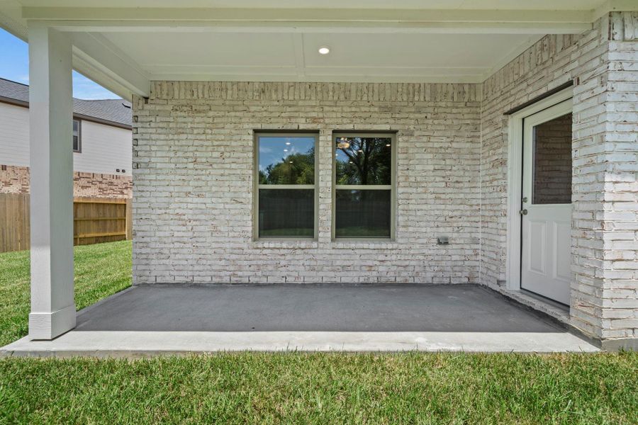 Exterior details and patio area of a home in Laurel Landing, Alvin (Image 4). Exterior details and patio area of a home in Laurel Landing, Alvin (Image 4).